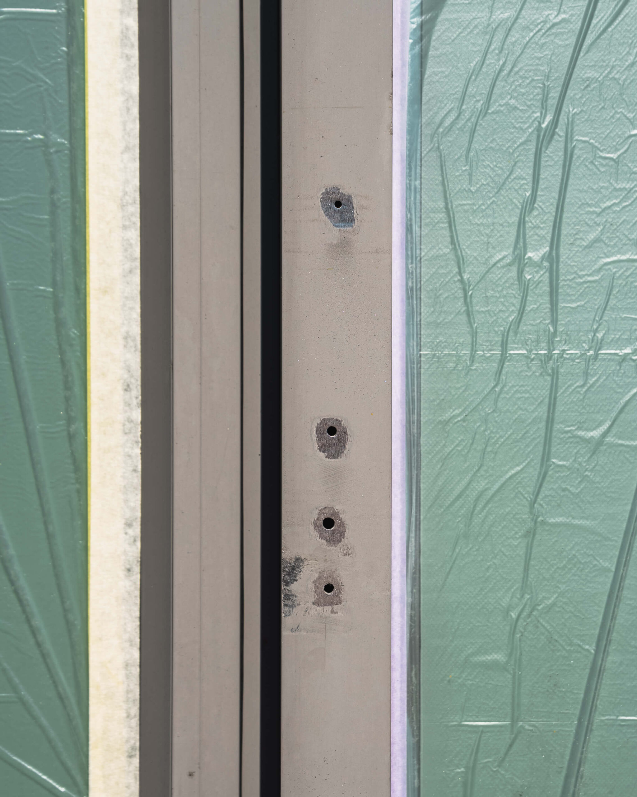walmsley-centre-joinery-remedials-01.jpg Commercial facade detail showing restored aluminium joinery